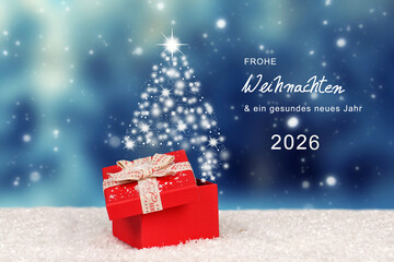 christmas background with gift box with glimmering christmas tree