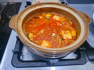 chili con carne,Kimchi jjigae or Kimchi soup in ceramic bowl
Korean kimchi stew.Korean traditional food