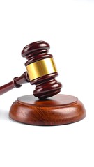Wooden gavel with a golden band resting on a matching wooden base