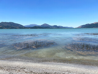 Lake Egirdir, Isparta, a mossy natural lake view against the hills.