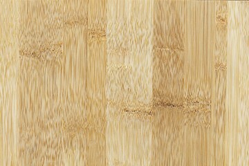 Bamboo flooring or cutting board with light vertical grain pattern