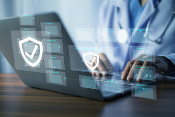 Doctor using laptop Cyber security network Data protection concept. Medical professional ensures patient information privacy with encrypted healthcare system and secure cloud technology.