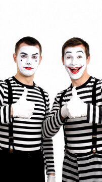 Two Mimes Giving a Thumbs Up on White Background