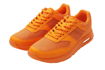 Pair of vibrant orange athletic shoes designed for running and casual wear stand out on transparent background