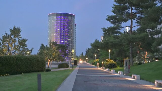 View of one the iconic car towers at  Autostadt in Wolfsburg, Germany during twilight