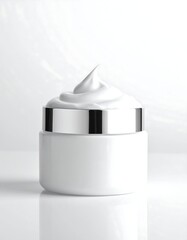 Jar of moisturizer with a swirl on white
