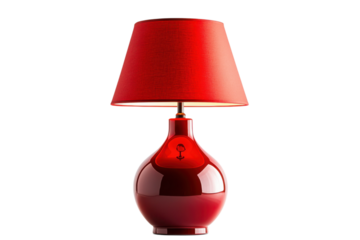 Elegant red table lamp with a fabric shade provides ambient lighting for a modern interior space on transparent background
