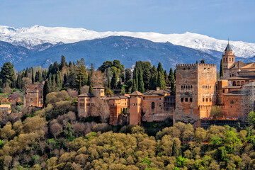 Granada. Palace complex Alhambra. Beautiful city in Spain with the Sierra Nevada mountains in the background. Travel, Tourism © Alvov