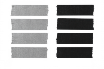 Black and white adhesive tape pieces with ripped edges, abstract textured design elements against transparent background