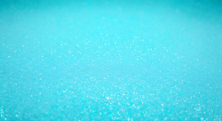 Obraz premium Sparkling Turquoise Surface Texture Background with Dazzling Glitter Reflecting Light Creates Dreamy and Enchanting Visual for Backdrops and Creative Projects