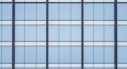 Geometric pattern of a modern skyscraper s glass facade reflecting the sky with clean lines and cool tones