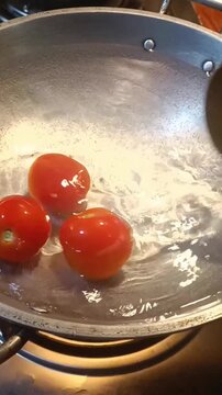 &ldquo;Whole Tomatoes Boiling in Hot Water&rdquo;