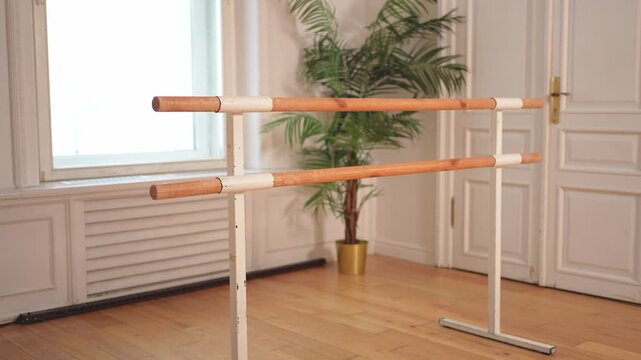 Empty ballet dance studio with barre. Professional ballet barre for stretching practicing dancing positions in dance school Dance hall ready for ballet class training. Ballet school
