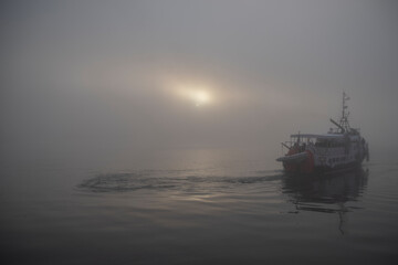 a ship in the fog at sea