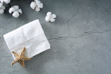 Terry white towel top view,spa and body care products display top view empty copy space.Bath and hygiene items.Showcase.