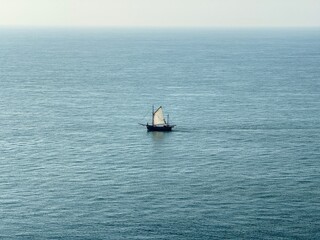 Lonely Ship Sailing Through the English Channel Under Soft Evening Light