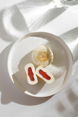 cottage cheese pancakes with strawberries on a white plate