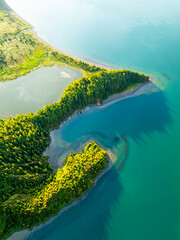 Lagoa do Fogo Lake at Sunrise. Green Lush Hills and Forest. Azores, Sao Miguel Island. Portugal. Aerial Overhead High Angle Shot