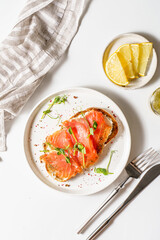 bruschetta with salmon on a white background