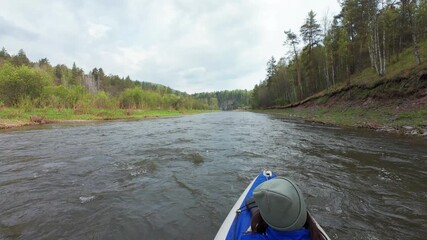 Enjoy a peaceful kayaking adventure on a vibrant river surrounded by lush greenery and stunning landscapes, perfect for nature enthusiasts and outdoor lovers seeking unique experiences