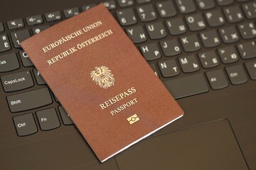 Austria Passport Lies Black Laptop