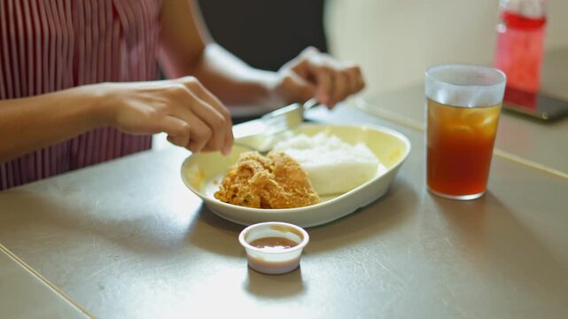 Family dinner simple chicken rice platter, family meal cozy hand spoons rice chicken tea, sauce home table touch, sharing warmth moment, fits lifestyle clips everyday family bonding rituals.