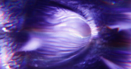 Blur purple flare. Light abstraction. Vibrant bright gleam color optical luminous flash on illuminated visual bokeh art background.