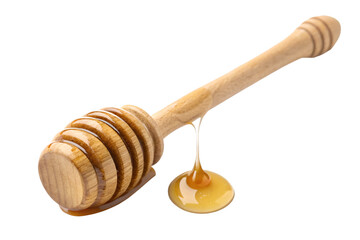 Wooden honey dipper with dripping golden honey on black background image