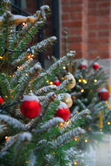 Festive pine tree decoration captured with a cozy, bokeh-filled background.