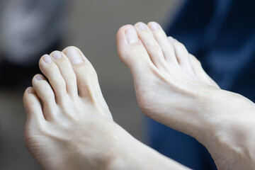 Close-up of Female Feet Resting on a Soft Surface. Pedicure Preparation or Relaxation