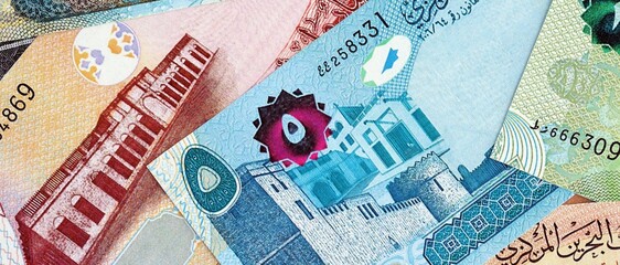 Bahraini dinar currency money bills. The current banknotes lies on table in big amount