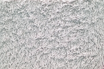 A white towel with a fuzzy texture