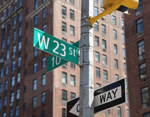 Obraz premium Street signs for West 32nd Street and 10th Avenue intersection New York City