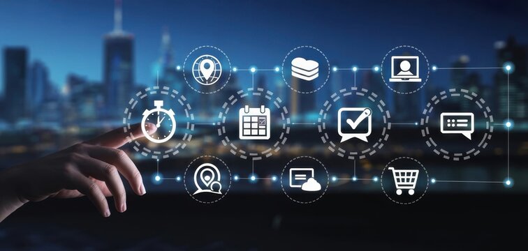 Digital Innovation: A modern cityscape serves as the backdrop to a person's hand interacting with a holographic interface.