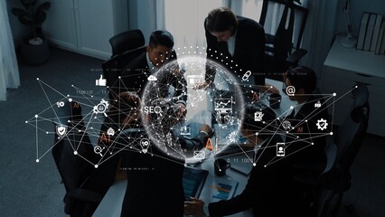 A dynamic business meeting with a diverse team collaborating over technology and digital interfaces, showcasing global connections and innovative ideas. Raster