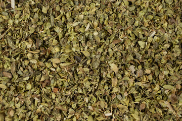 Top View of Dried Oregano. Macro Background for Food Styling.