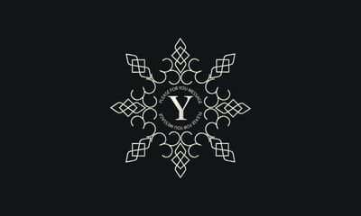 A luxurious monogram logo template for badge design featuring a centered letter Y. A trendy vintage frame illustration, perfect for a fashion boutique, store, or hotel brand.