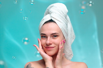 Smiling Woman in Towel Turban with Aqua Bubbles