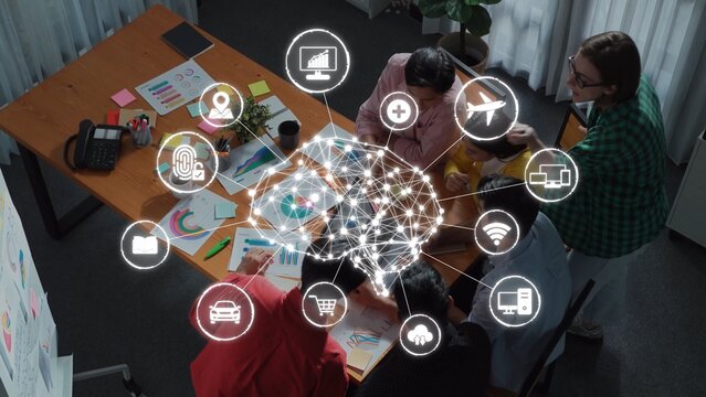 A vibrant office setting showcasing a collaborative business meeting, where professionals engage in brainstorming with digital tools and visual data to foster innovation and creativity. Raster