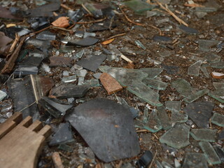 broken glass, rocks, and debris in the landfill.dirt.public