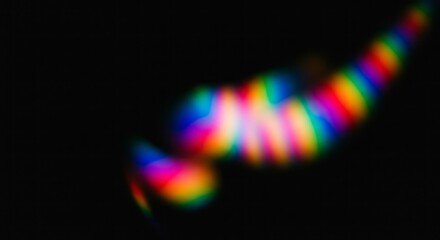 Abstract Rainbow Spectrum Light Bokeh on Black Background, Capturing Diffraction or Dispersion Effect for Scientific, Tech, or Artistic Designs