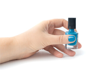 Applying nail polish in close-up. Getting manicures on your own at home