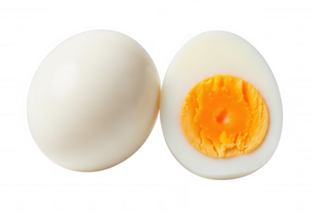 White egg halved showing yellow yolk isolated on a transparent background