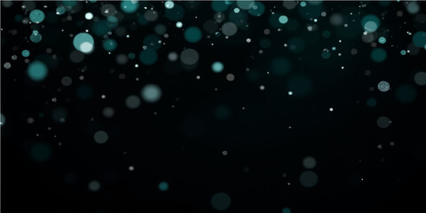 Bright, glowing blue water drops on glass texture create a winter holiday pattern with festive bokeh lights
