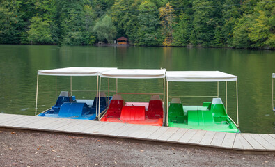 Water pedal boats in the lake.