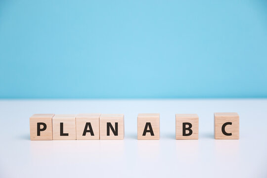 Wooden cube with PLAN A, B, C word. The concept of planning in business.