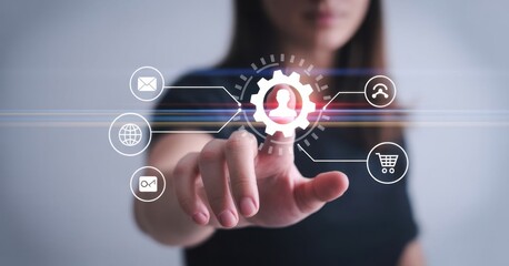 Innovation at Your Fingertips: A woman's hand, poised to activate a digital interface that promises streamlined technological advancement and human-centric automation.