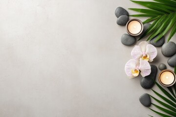 Minimalist spa background with gray pebbles, green palm leaves, and orchid flowers beside burning candles, ideal for wellness branding, relaxation design, and skincare product visuals