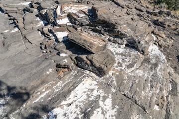 North Menan Butte Trail, tuff cones - volcanoes. Madison County, Idaho. Snake River Plain. Caliche. Tuff is a type of rock made of volcanic ash ejected from a vent during a volcanic eruption. 