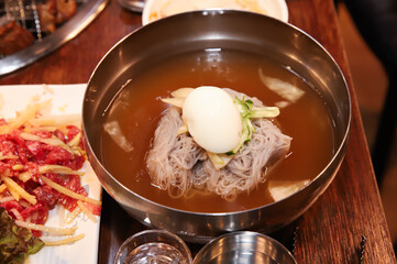 Korean cold noodles in chilled broth
